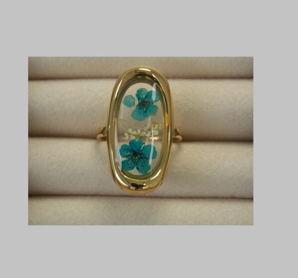 Anillo retro con flores azules