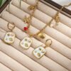Juego de cadena y aretes estilo playa